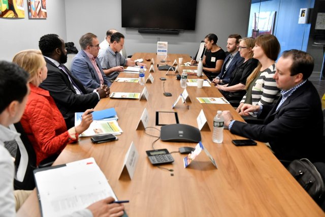 Administrator Wheeler serving food diverted from Yankees Stadium