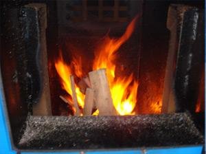 EPA and NYSERDA tested residential wood-fired heaters with various fuels to determine emissions.