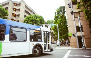 Bus turning a corner in a city downtown