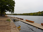 The Wilderness Inquiry voyageur canoes lined up and ready to launch on the Schuylkill River in Philadelphia