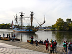 Paddlers on the Christina River in Wilmington get a surprise visit from the Kalmar Nyckel