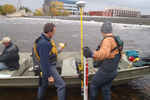 People on a boat in the Grand River/Grand Rapids