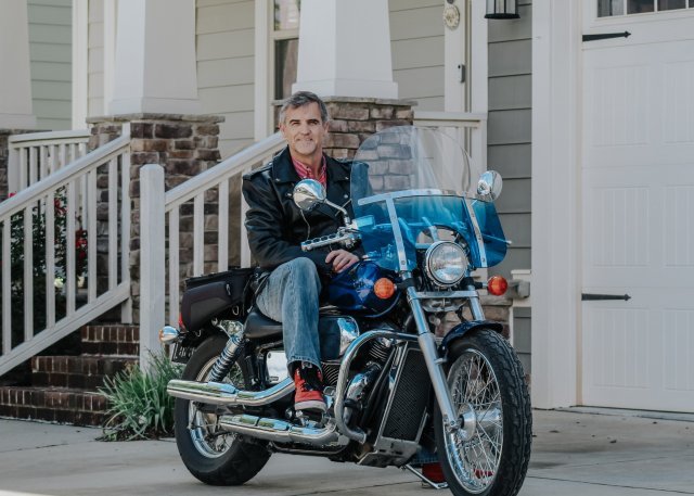 Dr. Williams on a motorcycle